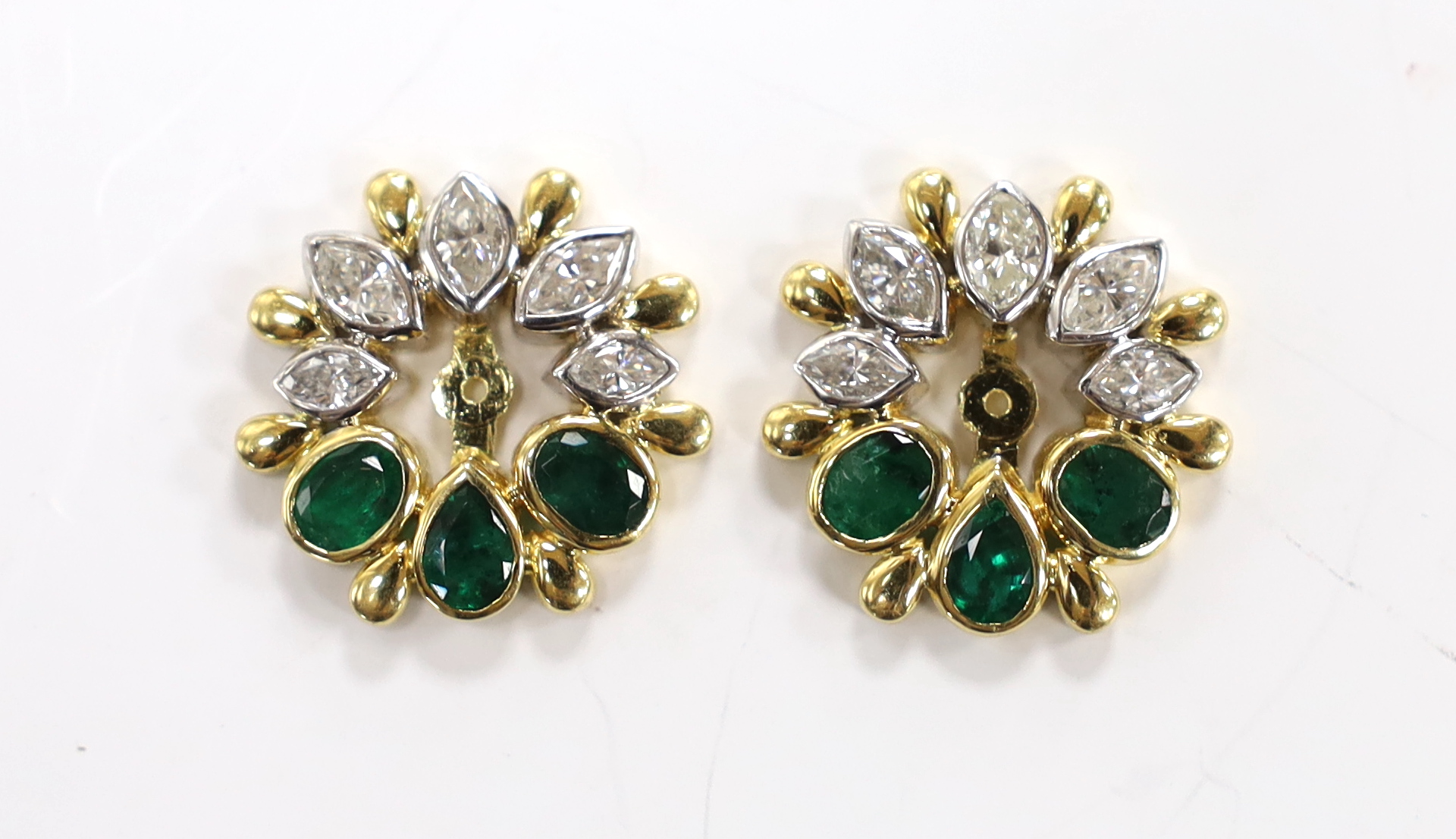 A modern pair of yellow metal, emerald and diamond cluster set circular earring attachments or surrounds, 20mm, gross weight 11.8 grams.